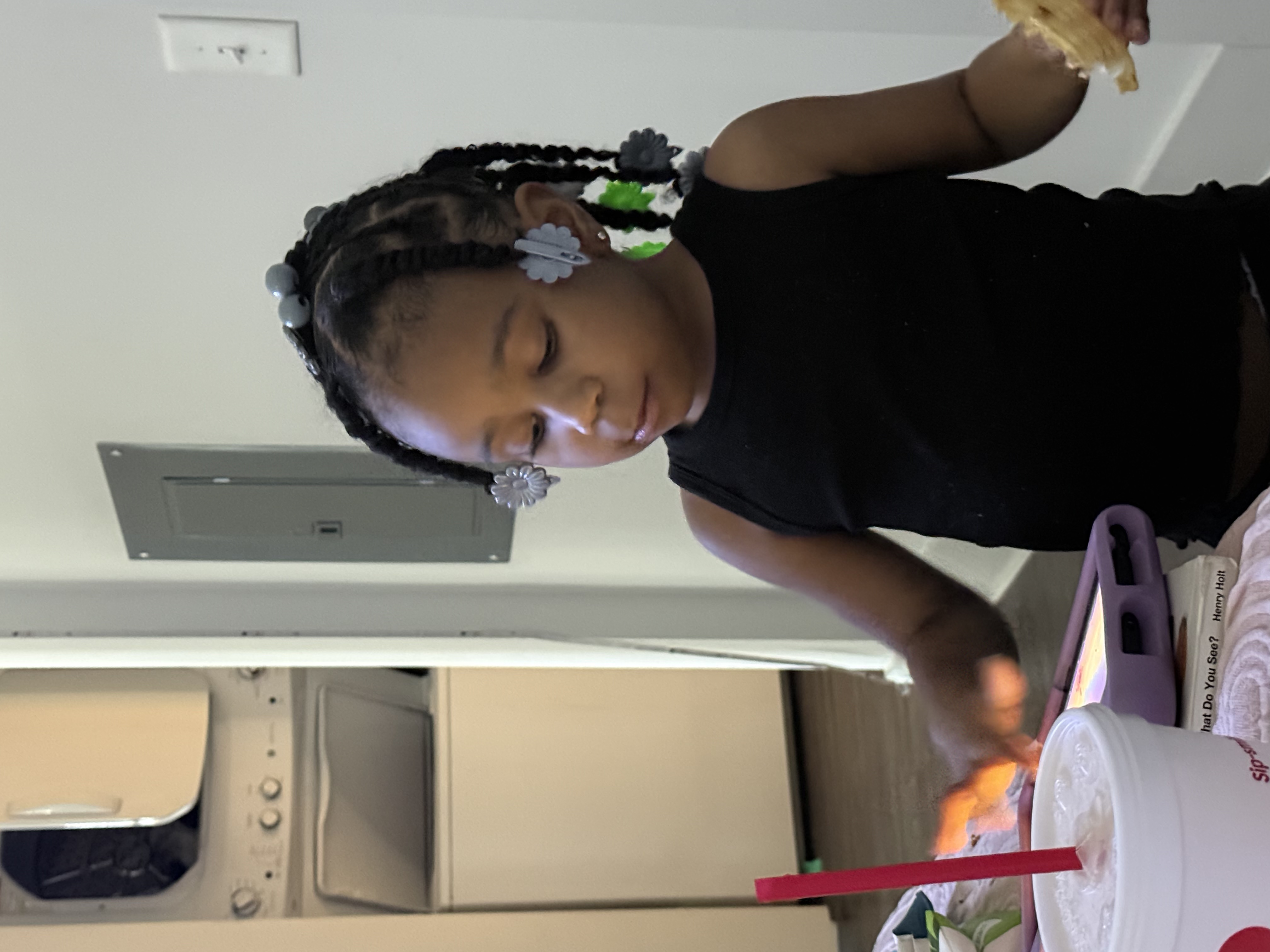 Cornrows in updo with bun